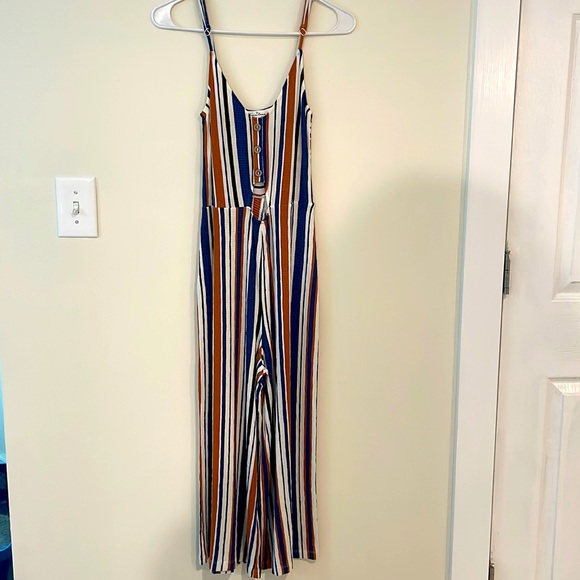 Jumpsuit Romper with peek a boo tummy - Picture 1 of 7